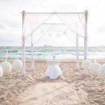 A beach wedding with white star decorations