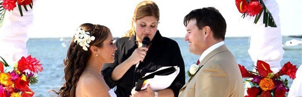 A wedding officiant at the beach