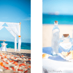A beach wedding with a white canopy and blue water.