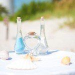 Glass bottles and sea shells