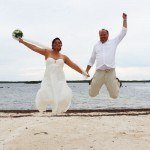 A husband and wife jumping