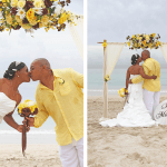 A man and woman kissing on the beach.