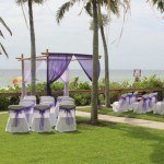 A wedding ceremony set up on the grass.