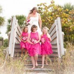 A bride and her two daughters on the stairs