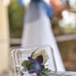 A plastic container with flowers in it
